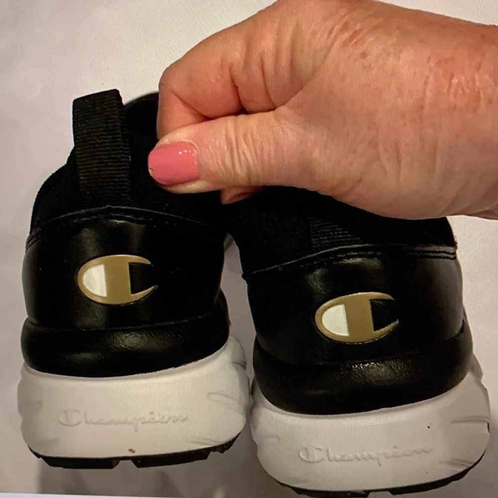 Champion Black and Gold Slip-On Sneakers Sleek Design, size 7